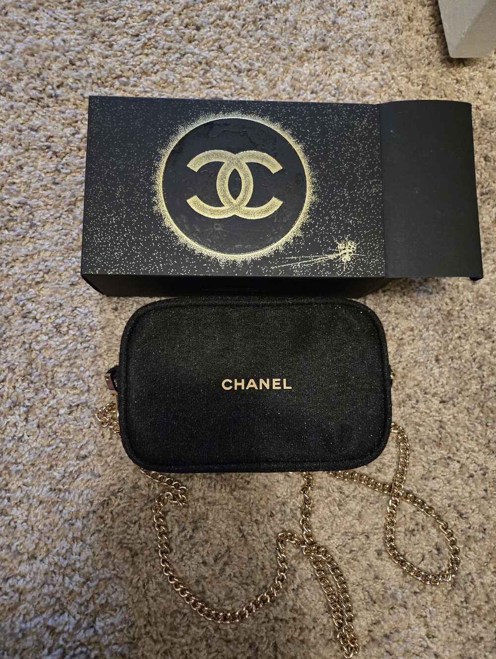 CHANEL Black Puch with Gold Chain